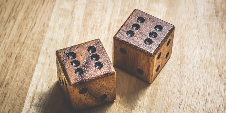 Used Dice on a Table