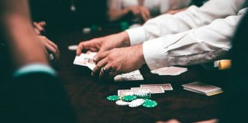 Group of People Play Poker