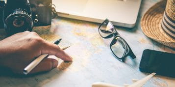 Travel Pack of a Map Notes and a Camera