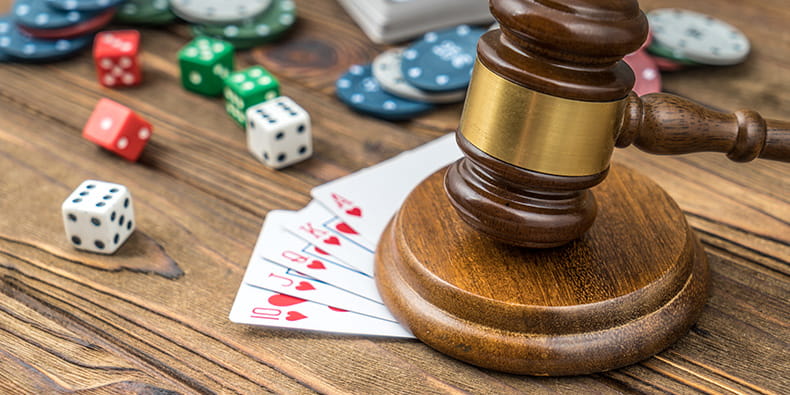 Gavel Alongside Dice and Cards