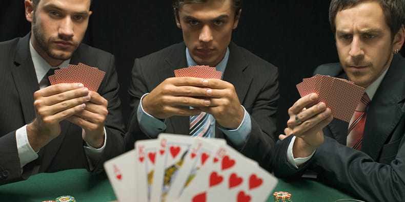 Four Men Playing Texas Hold 'em