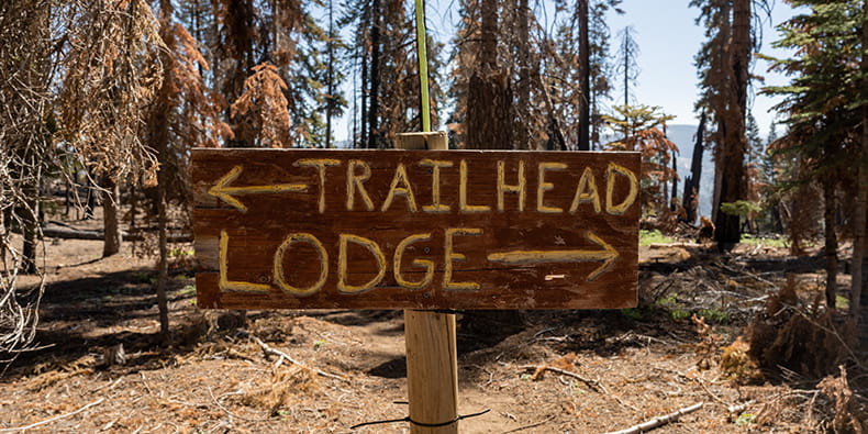 Road sign showing the direction of the neared lodge