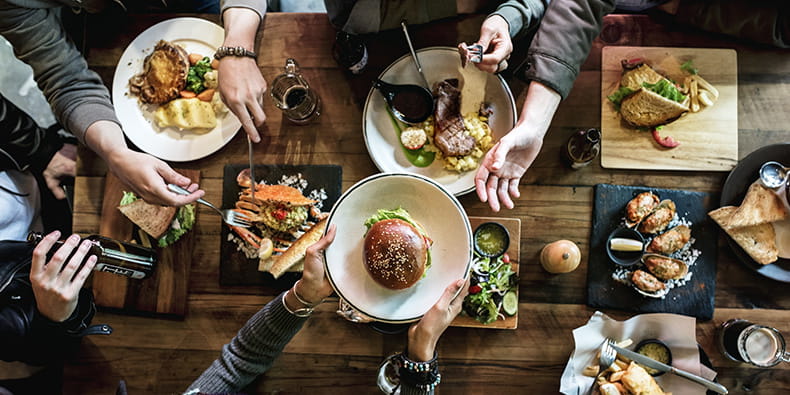 Group of friends lunching together