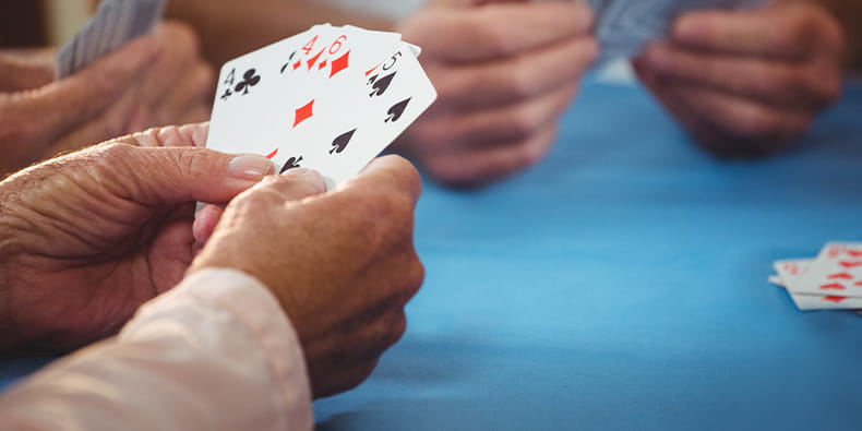 People Playing a Card Game 